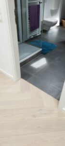 Übergang Fischgrätparkett zu Fliesen